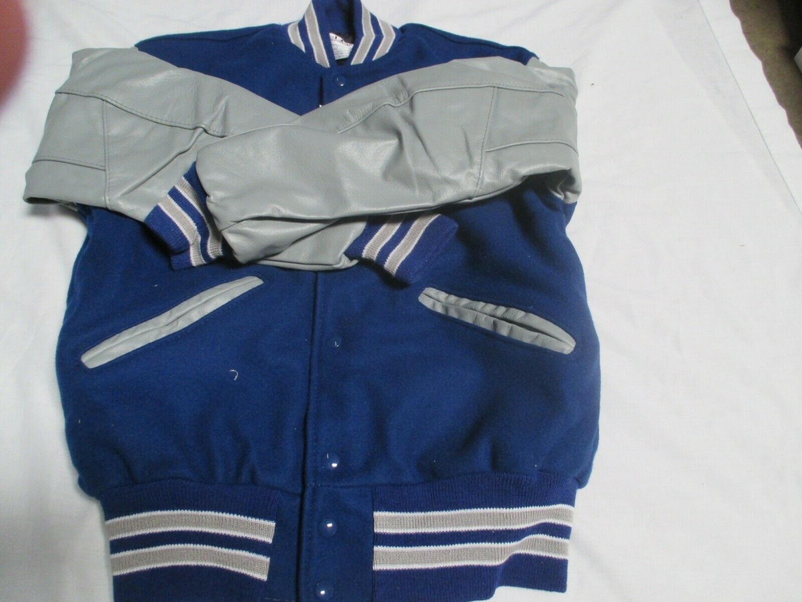 DELONG  ADULT ROYAL/ GREY QUILT LINED GREY STRIPES OUTLINED IN WHT LETTER JACKET