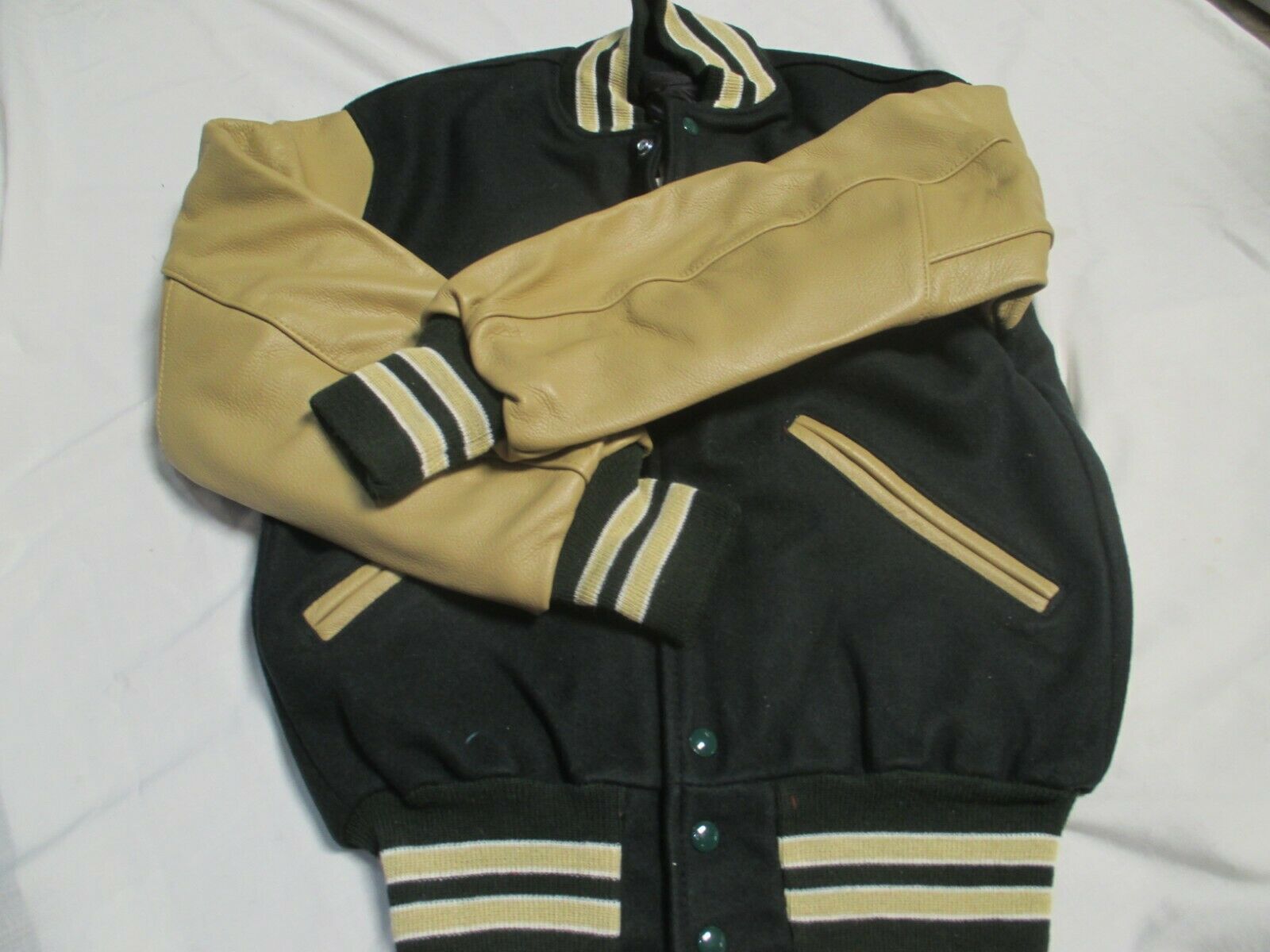 DELONG  ADULT DK.GRN QUILT LINED VEGAS GLD SLEEVES & 2 VEGAS GLD STRIPES