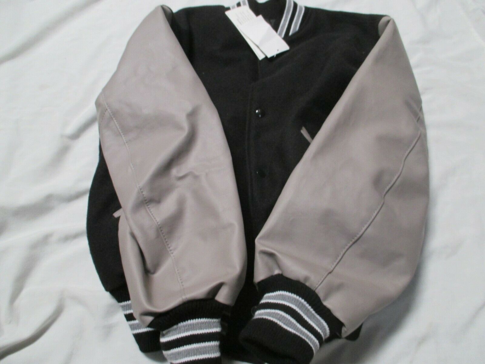 DELONG YOUTH LARGE BLACK GREY  JACKET WITH 2 GREY STRIPES OUTLINED IN WHITE