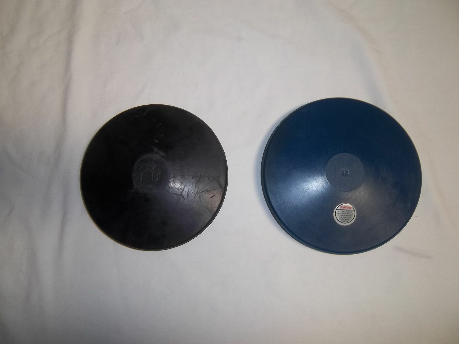 ATHLETIC SPECIALTIES RUBBER DISCUS( VARIOUS SIZES)
